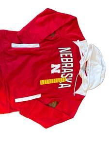 lot 2590 image: Ladies Nebraska Huskers fleece pullover with pockets, size medium