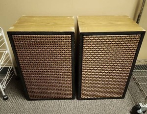 lot 211 image: Large Mid Century Woven Grill Speaker Pair (no brand markings) - some wear on the laminate edges on the top  (untested, but last known to be working)