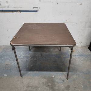 lot 303 image: Folding Card Table with Metal Legs - has rips in the vinyl
