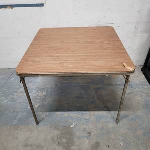 lot 304 image: Folding Card Table - has tears on the vinyl