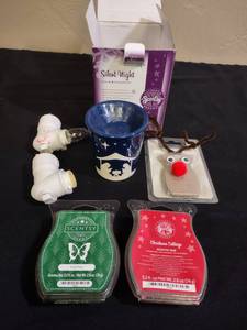 lot 320 image: Scentsy Christmas Collection Bundle with partially used wax melt packages and a reindeer air freshener