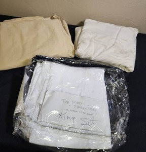 lot 361 image: 3 King Size Top sheets.  White sheet has 2 pillow cases with it and is in new condition.  Tan and Beige w tan floral are both used condition with minor wash wear