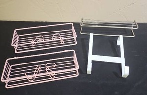 lot 389 image: Two pink wall mountable metal wire shelves (one slightly larger than the other), one silver metal wire shelf with towel bar, and one white metal over the door hook