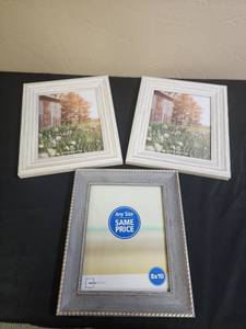 lot 395 image: 8x10 Picture Frame Set - Two White Farm Style frames both new (but one has the table stand broken off the back) and one gray with silver metal edge accent new condition