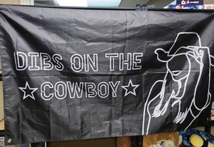 lot 340 image: Dibs on the Cowboy Fabric Banner with Grommets 56 W x 34 H