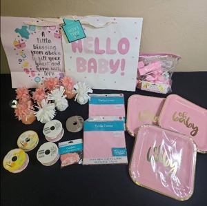 lot 426 image: Pink Baby Girl Baby Shower Party Supplies - balloon weights, napkins and plates (new in wrapper), ribbon, 2 new gift bags, confetti and more