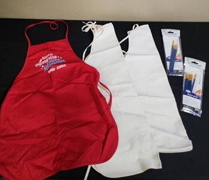 lot 422 image: 3 Aprons perfect for crafting (minor stains on one of the white ones) and brand new paint brushes (not full sets, each pouch missing a few from the package count)