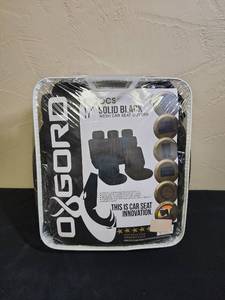 lot 541 image: 17pc Black Mesh Car Seat Cover Set - new in package, includes a wheel cover