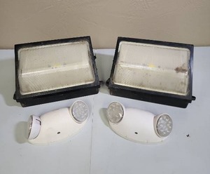 lot 556 image: LED Security Lights - including two large black lights and two smaller white lights - untested