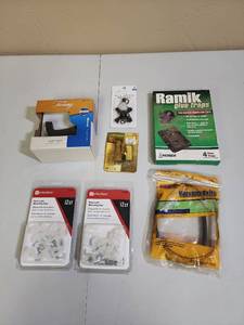 lot 557 image: Home Maintenance Bundle - new Tuscany Robe Hook, Rope Light Mounting Clips, Mouse Traps, FanLight Pull Chain, Vacuum Belts, and a Straight Valve - all new in package