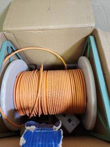 lot 569 image: Honeywell CAT6 Network Cable - original length 1000ft - some cabling has been used, but still a lot left