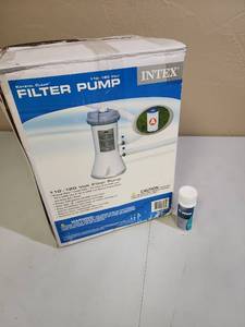 lot 525 image: Intex Krystal Clear Filter Pump Model 603 with Test Strips