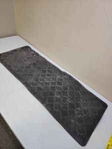 lot 573 image: Moroccan Pattern Padded Mat - was used in the garage -  17 x 46