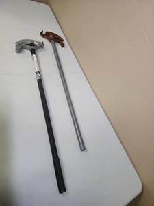 lot 580 image: Southwire EMT Conduit Benders - one is heavy with patina, the other is new condition