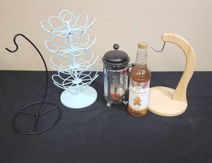 lot 675 image: Kitchen Bundle with French Press, K-Cup Tree, 2 Banana Stands, and a bottle of Gingerbread Sugar Free Syrup