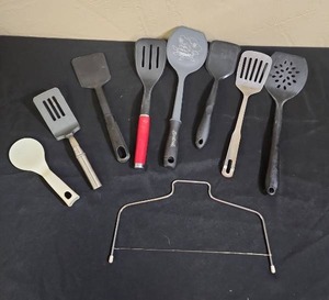 lot 692 image: Spatulas and a large cheese cutter