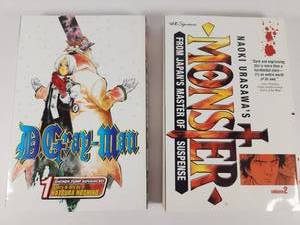 lot 205 image: D.Gray-man Vol. 1 & Monster Vol. 2 Manga Bundle
