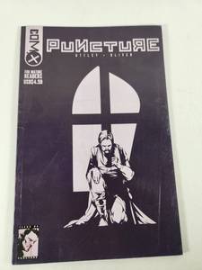 lot 275 image: Puncture Comic Book Issue #4