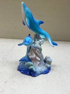 lot 544 image: Blue Dolphin Family Figurine with Coral Base