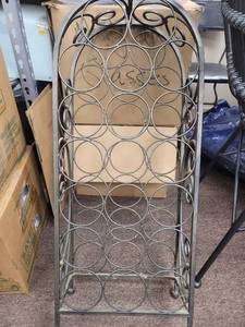 lot 3284 image: Metal Wine Rack with Circle Design