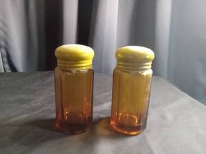 lot 2332 image: Amber Glass Salt and Pepper Shakers with Yellow Lids