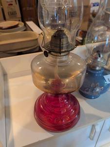 lot 2619 image: Large Antique Red Glass Oil Lamp with Embossed Scroll Design