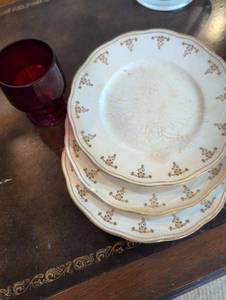 lot 2634 image: Elegant White saucers with Ruby Glass