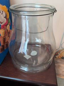 lot 2637 image: Kirklands Clear Glass Lantern with Metal Handle