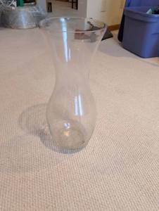 lot 2665 image: Clear Glass Hourglass Shaped Vase 28 inch tall