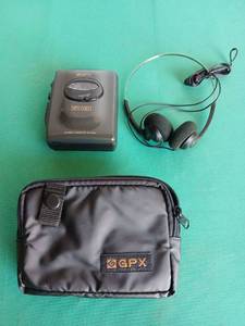 lot 9106 image: GPX Bass Boost Stereo Cassette Player with Headphones and Carrying Case Bundle