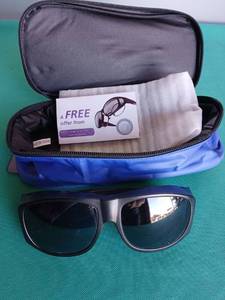lot 9117 image: Allergan Sunglasses with Case and Wooden Rooster Cutout