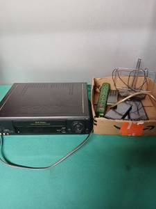 lot 9126 image: Sony VCR VHS Player with Remote and Accessories Bundle - Retail $25