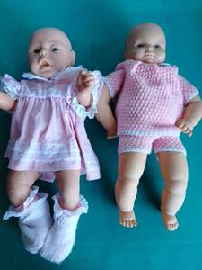 lot 9178 image: Baby Dolls with Pink Gingham Outfits and Knitted Clothes - Retail $25