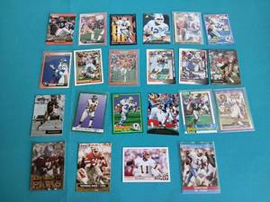 lot 9219 image: NFL Football Trading Cards Collection Mixed Years and Players - Retail $15 Featuring Jim Kelly - Herschel Walker - Jim Harbaugh