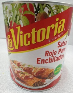 lot 3438 image: La Victoria Red Enchilada Sauce Can  Net weight 6 lb 6 oz - Best by Apr 2026