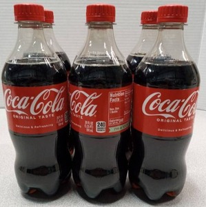 lot 3445 image: Coca-Cola Original Taste 20 FL OZ Plastic Bottles Best By April 20, 2026