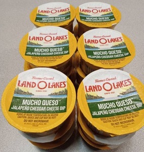 lot 3450 image: Land O Lakes Mucho Queso Jalapeno Cheddar Cheese 18 Dip Cups Best by 592026