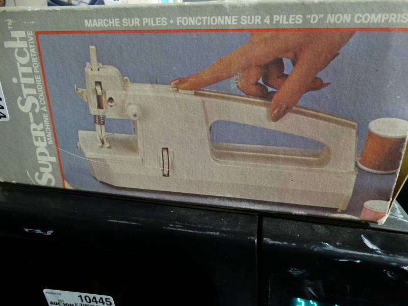 lot 10444 image: portable sewing machine