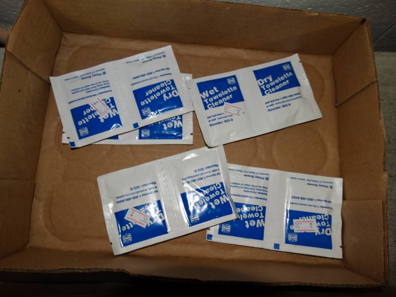 lot 10506 image: Lot of Wet Towelette Cleaners and No Slip Phone Mats