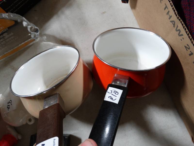 lot 10595 image: 2 Small Sauce Pans w Porcelain Coating