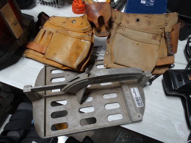 lot 10755 image: Tile Saw w Carpenters Belt