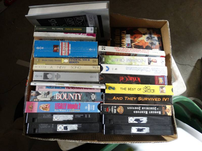 lot 10593 image: Lot of VHS Movies and Books