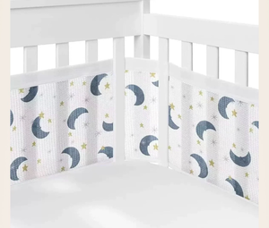 lot 5528 image: Pack of 2 Warm and Breathable Moon, Stars and Rainbow Crib Bumpers