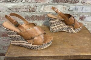 lot 5588 image: Eva & Zoe Tan Leather Slingback Wedge Sandals Featuring Crisscross Straps and a Patterned Raffia or Woven heel (Size 8M)