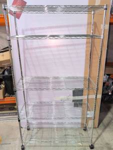 lot 61 image: 5-Tier Chrome Wire Shelving Unit with Wheels  - Retail $55