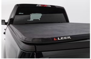 lot 16487 image: LEER 2019 Dodge Ram LATITUDE New Style 5Ft7In Tonneau Cover - Folding Full Size Short Bed - Retail $449