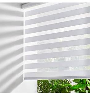 lot 16547 image: Persilux Zebra Blinds for Windows, Cordless Roller Shades Window Treatments (69 W x 72 H, White) Light Filtering Dual Layer Roller Window Shades Light Filtering Sheer Shades for Home and Office - Retail $109