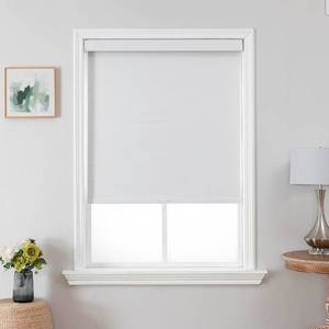 lot 16556 image: Joydeco 100% Blackout Roller Shades Cordless Blinds for Windows, Free-Stop Shades, UV Protection, Natural Woven Blinds for Home and Office, Light-Proof Aluminum Cover (White, 69 W x 75 H) - Retail $114