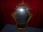 Gold Framed Unique shaped Mirror