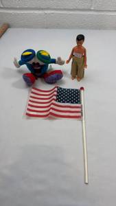 lot 110 image: 1990s Dominos Noid Plush with Action Figure and American Flag